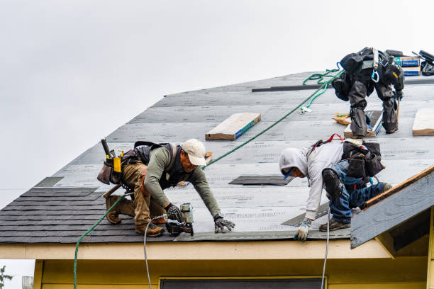 Professional Roof Replacement technician working in Enfield Center, NH